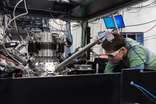 Experimental setup in the EUV Plasma Processes lab. The tubes have detectors on the ends to measure different plasma outputs, including light and tin ions. Photo: Floris Krelage